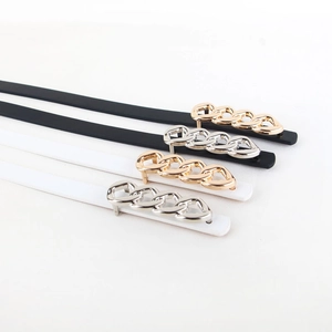 Slim fashion waist belts in black and white with gold and silver chain metal buckles