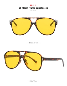 Close-up of aviator sunglasses with tortoiseshell frames and yellow lenses, C6 model details