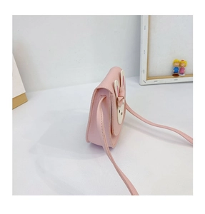 Side view of pink rabbit-shaped children's crossbody bag with PU leather texture