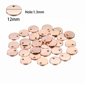 Detail of 12mm rose gold stainless steel round tags with a 1.3mm hole for DIY jewelry