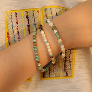 Bohemian style triple-layer beaded bracelet with natural turquoise and pearl accents