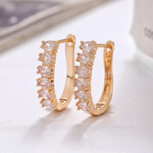 U-shaped gold stainless steel earrings featuring sparkling white drop-cut cubic zirconia