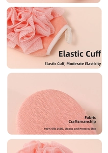Detail of pink 250D rayon bath glove with mesh flower and elastic ribbed cuff