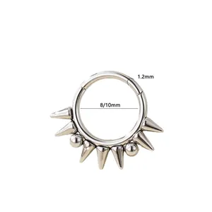 Punk style stainless steel septum ring with five sharp spikes and smooth metal finish