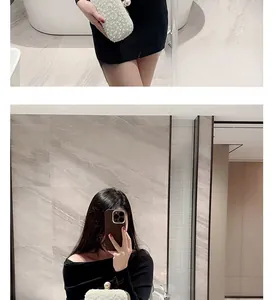 Detailed view of luxury pearl evening clutch bag paired with elegant black party dress
