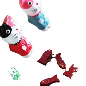 Hand-painted Nordic style wooden fishing cat figurines in red and blue outfits