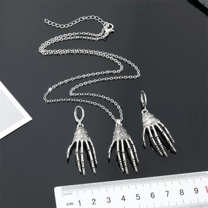 Gothic punk silver skull hand pendant necklace and earrings set with ruler measurement