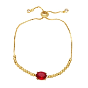Gold adjustable bracelet with oval red zircon center and sliding bead closure