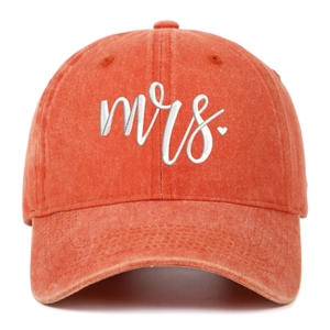 Detailed embroidery of white Mrs text and heart on vintage washed orange cotton baseball cap