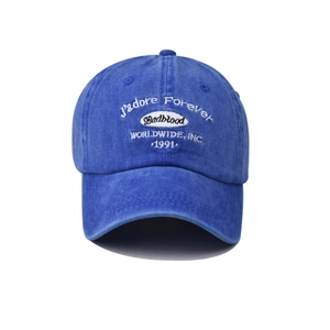 Detailed embroidery of J'adore Forever lettering on navy cotton baseball cap