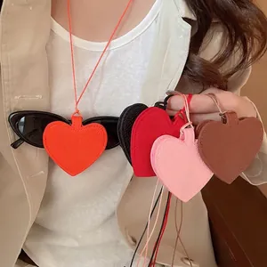 Fashionable heart leather pendant accessory in multi-colors with fine stitching detail
