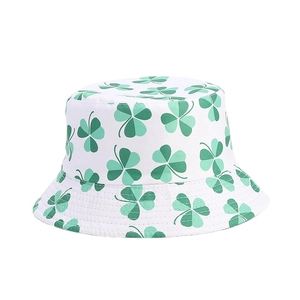 White bucket hat with green shamrock print for St. Patrick's Day outdoor fashion