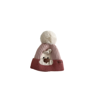 Cute knitted baby winter set with colorful animal pattern hat and fluffy pompom