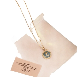 Vintage gold necklace with teal rose flower relief pendant and a small white pearl