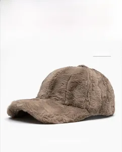 Detail of light brown faux rabbit fur baseball cap showing soft plush texture and seams