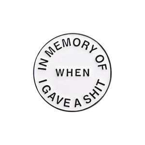 Round white enamel pin badge with funny text In memory of when I gave a shit