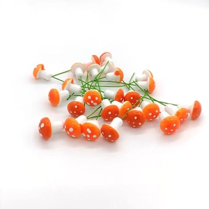 Miniature red and white spotted mushroom ornaments for Christmas tree and DIY crafts