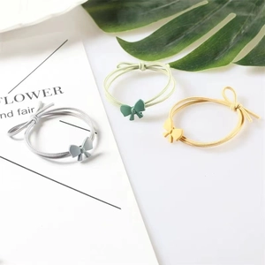 Three-piece set of sweet bow hair ties in gray, green and yellow with high elasticity