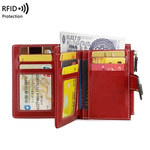 Detail view of red PU leather wallet with RFID blocking, multiple card slots and zipper pocket