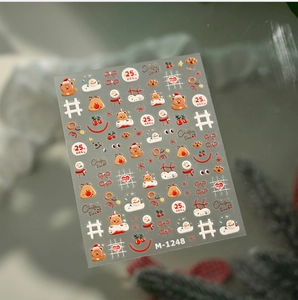Detailed view of Christmas nail art stickers M1248 with cute bear, reindeer, and snowman