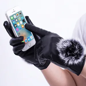 Winter thermal leather gloves with faux fur pom pom and sensitive touchscreen support