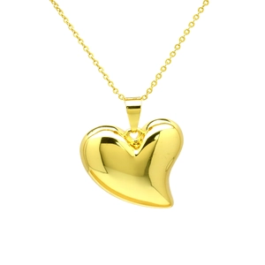 Close-up of gold heart pendant necklace featuring sparkling cubic zirconia stones