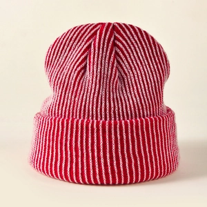 Winter striped knit beanie in red and white with a warm folded cuff for outdoors