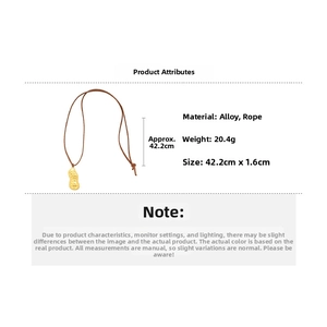 Peanut pendant necklace detail with gold textured finish and brown adjustable cord