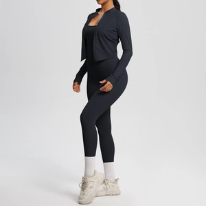 Detailed side view of 3-piece black yoga set with jacket, sports bra, and high-waist leggings