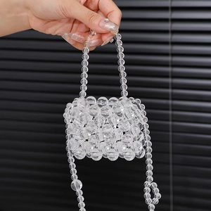 Handmade clear beaded mini tote bag for girls featuring transparent acrylic woven beads