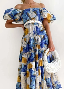 Detail of floral off-shoulder mini dress with bubble sleeves and white woven belt