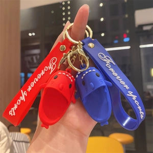 Creative shark slipper keychain with silicone wristlet strap and Forever Sports logo