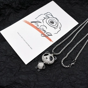 Chic panda pendant necklace with sparkling rhinestones and box chain on black background