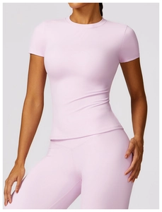 Detail of lavender yoga set featuring high-waist leggings and short sleeve slim-fit top