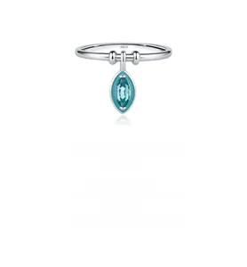 Detailed macro of S925 sterling silver ring featuring a marquise teal gemstone pendant