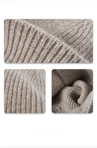 Macro shot of oatmeal ribbed knit texture showing soft wool fabric detail and craftsmanship