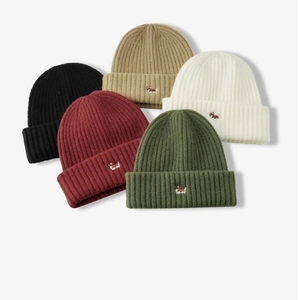 Set of five unisex knitted beanies with cute corgi embroidery in various colors