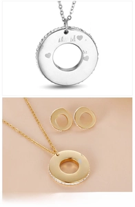 Detail view of Mom pendant necklace and stud earrings set with sparkling rhinestones