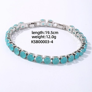 Detail view of silver hip hop bracelet with light blue zircon and dimensions 19.5cm