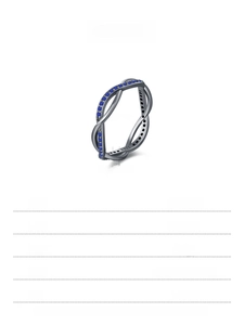 Macro detail of S925 sterling silver Mobius ring with blue pavé diamonds and 1.40g weight