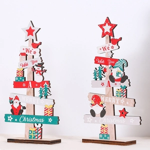 Detail of wooden Christmas tabletop signs with Merry Christmas text and festive characters