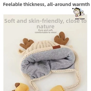 Detail showing plush grey fleece lining and thick knitted texture of the winter baby hat