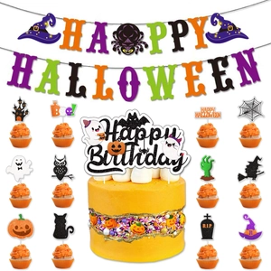 Glittery Halloween cake toppers featuring ghosts, pumpkins, and bats with spooky banner