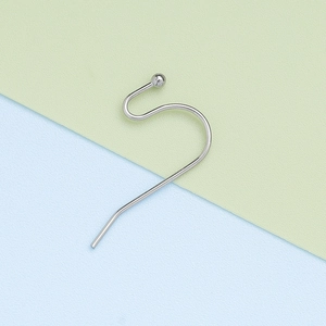 Close-up of a 304 stainless steel ball head ear hook component for DIY jewelry