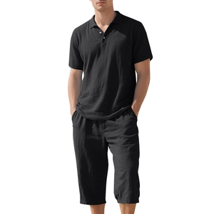 Close-up of breathable black cotton-linen texture on men's summer casual polo and shorts set
