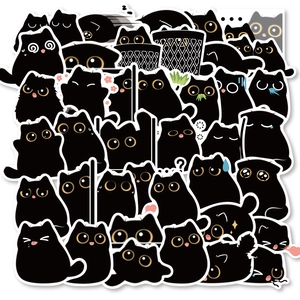 Detail view of various cute cartoon black cat stickers with multiple facial expressions