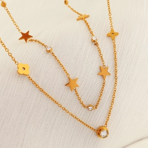 Double-layer gold plated necklace with star and flower pendants and white rhinestones
