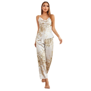 Women satin cherry pajama set with camisole and pants featuring elegant floral prints