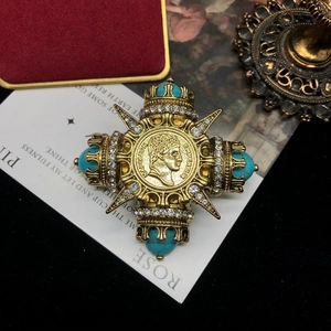 Vintage gold cross brooch with turquoise stones and Napoleon coin center in retro style