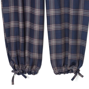 Women's casual blue plaid cargo pants featuring cuffed ankles and decorative bow detail